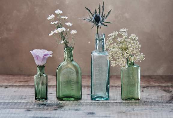 glass_bottles_vases_flowers at Cypress Meadows Senior Apartments, Ventura, CA