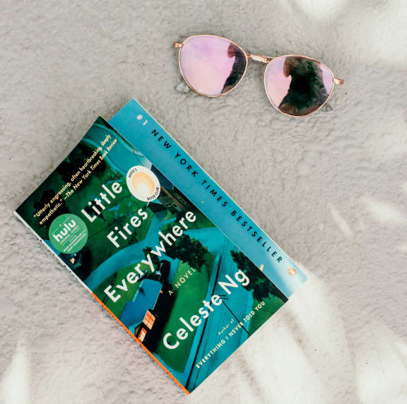 book and sunglasses at Cypress Meadows Senior Apartments, Ventura, CA, 93003