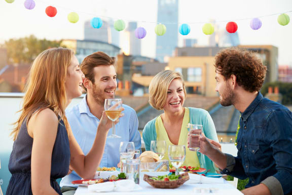 Friends Enjoying Dining at Oceanwood Apartments, Lompoc, CA