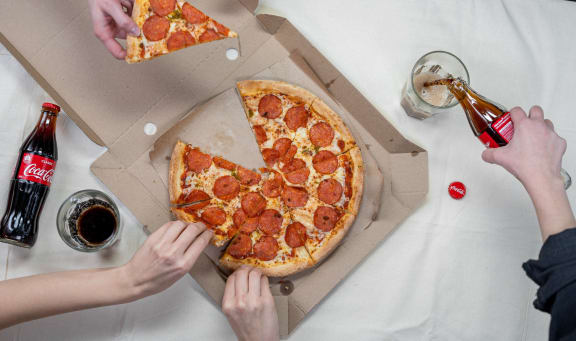 friends_sharing_pizza at Oceanwood Apartments, California, 93436