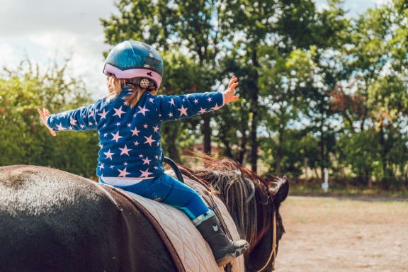 little_girl_horse_riding at Oceanwood Apartments, California, 93436