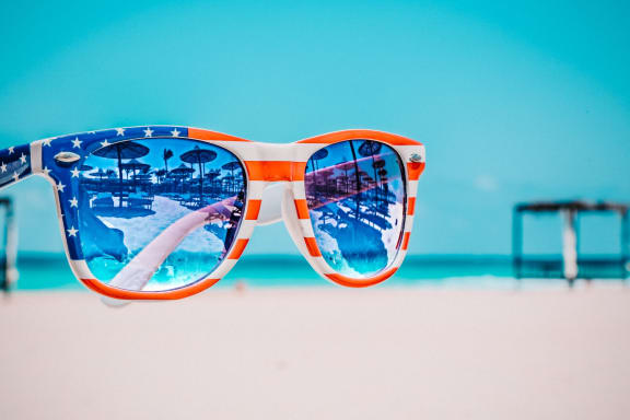 star and stripes sunglasses on beach at Oceanwood Apartments, Lompoc, CA