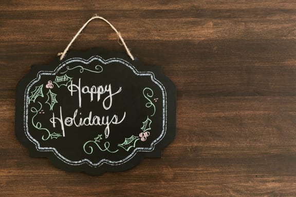 Sign Of Happy Holidays at Oceanwood Apartments, Lompoc
