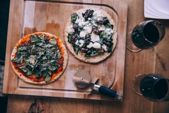 pizza and wine at Oceanwood Apartments, California, 93436