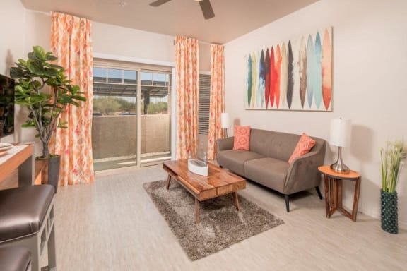 Living Room with Couch and Sliding Glass Doors at Ascend at Red Mountain, Arizona, 85215