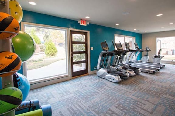 Health and Fitness Center Fully Equipped with Cardio Machines and Yoga Equipment, Complete with a View at Artesian East Village, Atlanta, GA 30316