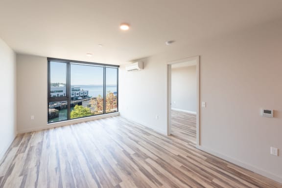 Living Space with Wood Flooring at 10 Clay Apartments in Seattle, WA, 98121