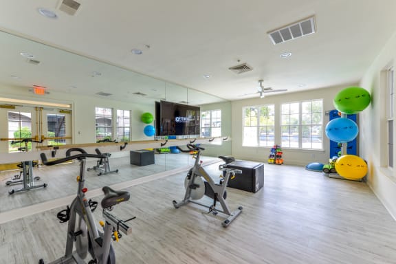 Fitness Center With Yoga Studio Fitness On Demand at The Bluestone Apartments, Bluffton, SC