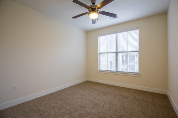 Wooden flooring  and window in bedroom1 at West 39th Street Apartments, Missouri