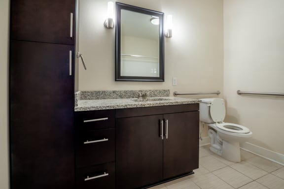 Bathroom with mirrorat West 39th Street Apartments, Kansas City, MO, 64111