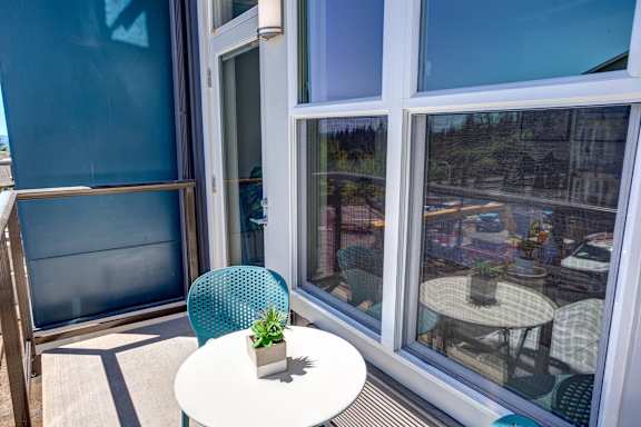 Outdoor seating at Commons at Sylvan Canyon Apartments, Oregon, 97221