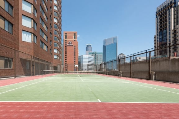 Smooth And Well Kept Tennis Court at Bolero Flats Apartments, Minnesota, 55403