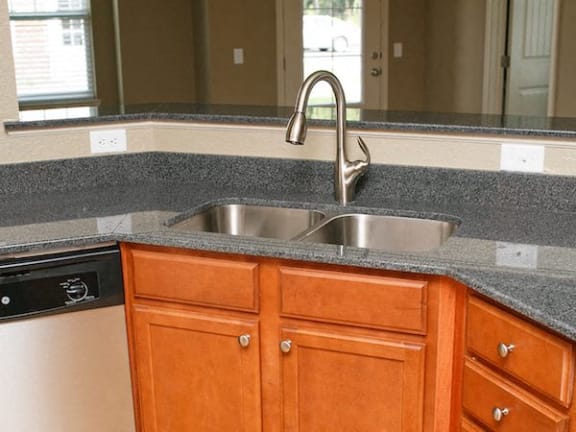 granite countertops in modern kitchen at Fenwyck Manor Apartments, Chesapeake, Virginia