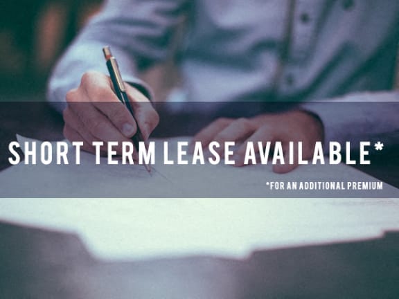 Man signing a short term lease at Fenwyck Manor Apartments, Chesapeake, VA, 23320