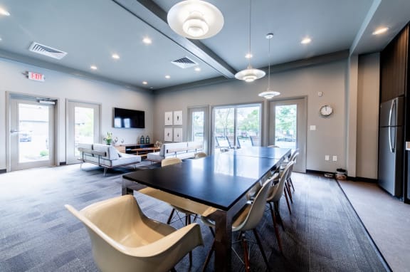 Eat-In Table With High Chairs In Clubhouse at Woodbridge Apartments, Louisville, KY, 40242