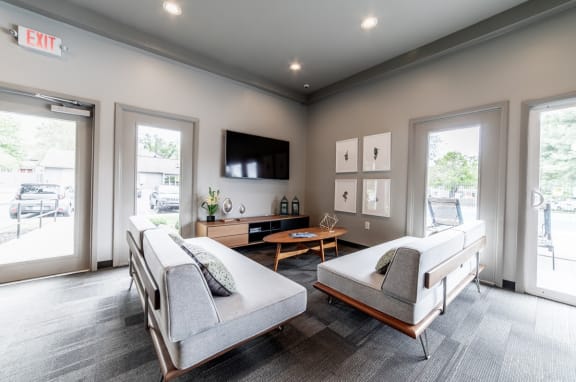 Tv Room At Clubohuse at Woodbridge Apartments, Louisville, KY