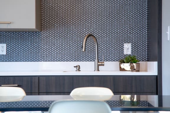 Sink With Faucet at Woodbridge Apartments, Louisville