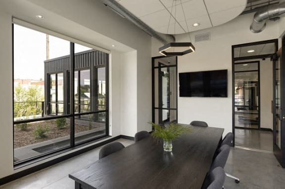 Conference Room With TV at Lyndy Apartments, Minneapolis, Minnesota