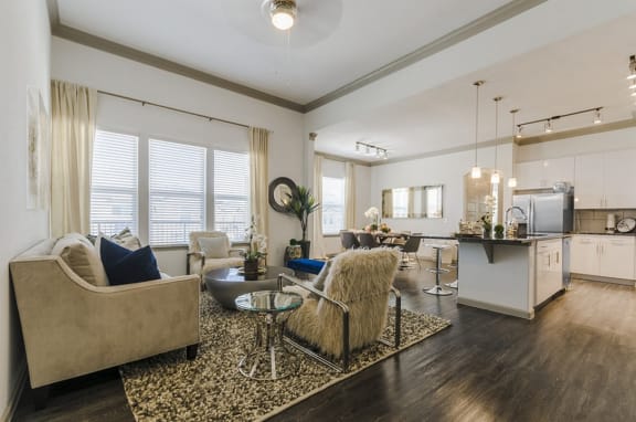 Living Room with Kitchen View at Mansions of Georgetown, Texas, 78626