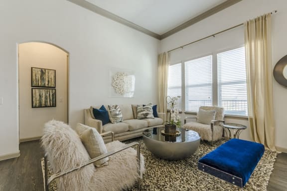 Living Room With Oversized Windows And Doors at Mansions of Georgetown, Georgetown, 78626