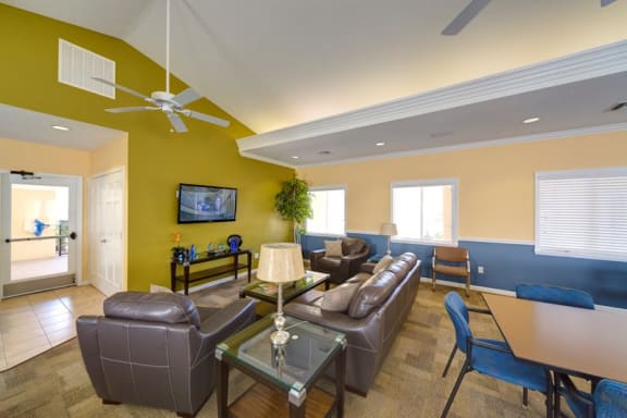 Clubhouse With Comfortable Sofa at Holly Cove Apartments, Orange Park, FL