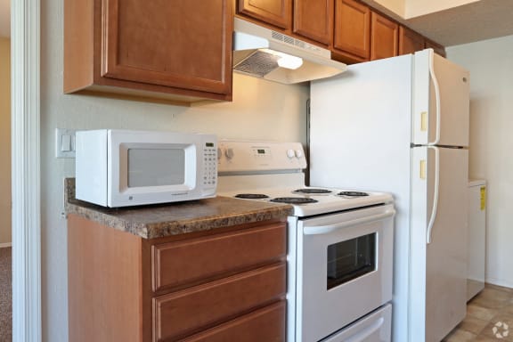 Kitchen With White Appliances at Champions Club, Glen Allen, 23060