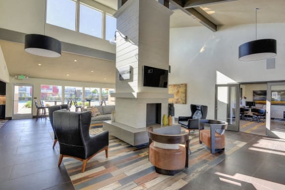 Clubhouse with Wood Inspired Floor, Chairs at Addison Ranch Apartments, Petaluma, CA, 94954