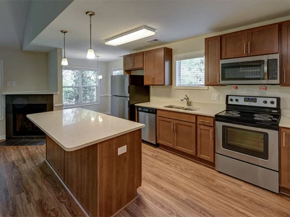 Cherry Cabinets in Kitchen at Cambridge Apartments, North Carolina, 27615