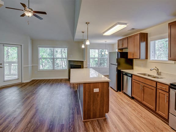 Lighted Ceiling Fan in Living Room at Cambridge Apartments, Raleigh, 27615