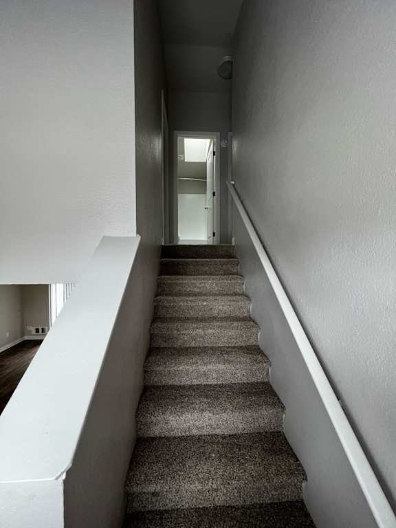 Secondary staircase to sleeping areas in Madrona unit