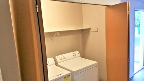 Laundry closet in hallway