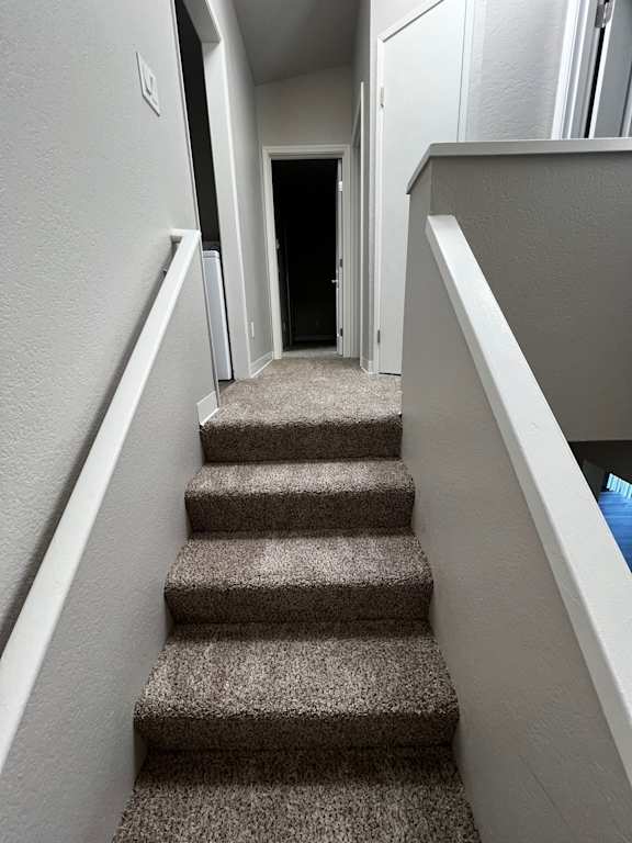 Staircase to sleeping areas in Lakeview unit