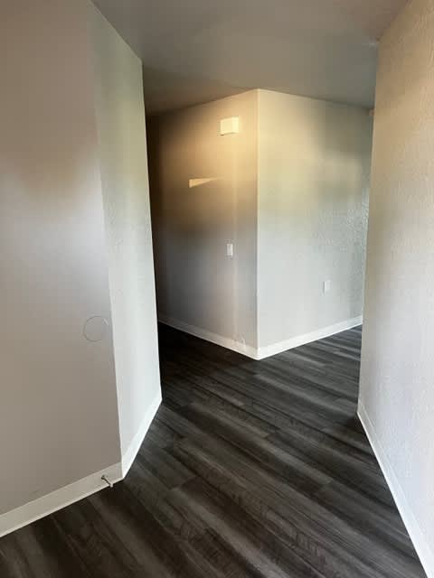 Hallway to Living areas to left and sleeping areas to right