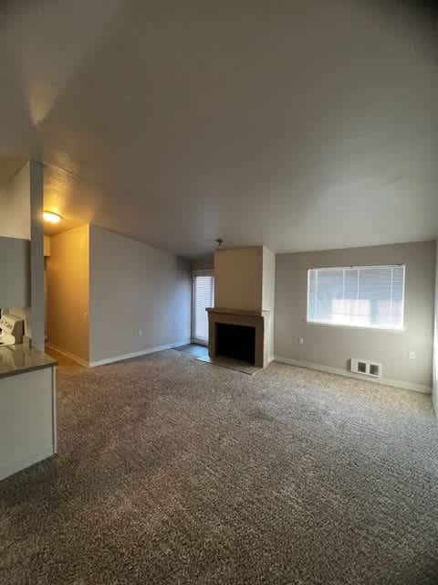 View of Living Room from Dining Room in Cedar unit