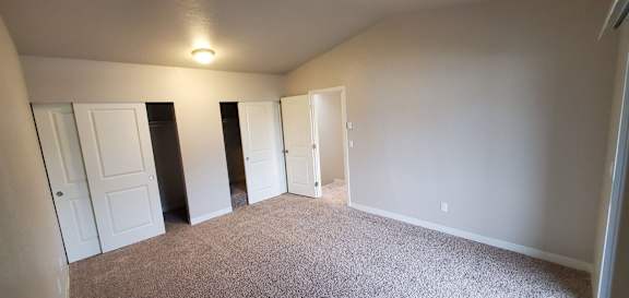 View of 2 closets in Master bedroom in Waterleaf unit