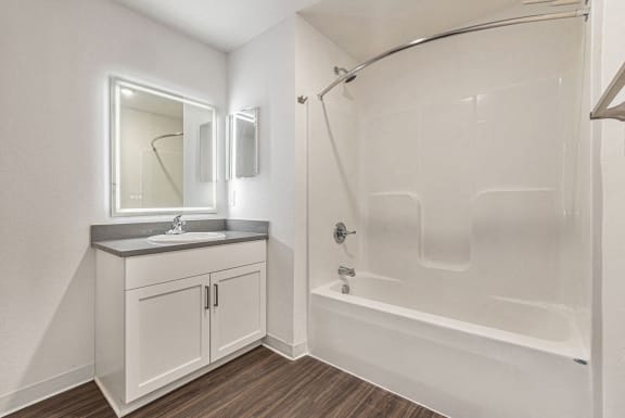 Main bathroom with hard surface flooring at Eagle Ridge Apartment Homes, Traverse City, MI 49685
