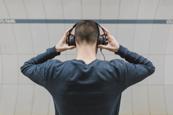 Man Listening To Music at Pine Village, North Carolina
