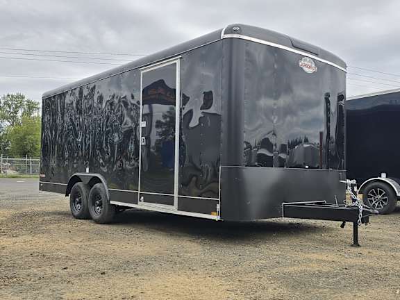 A black trailer with a door