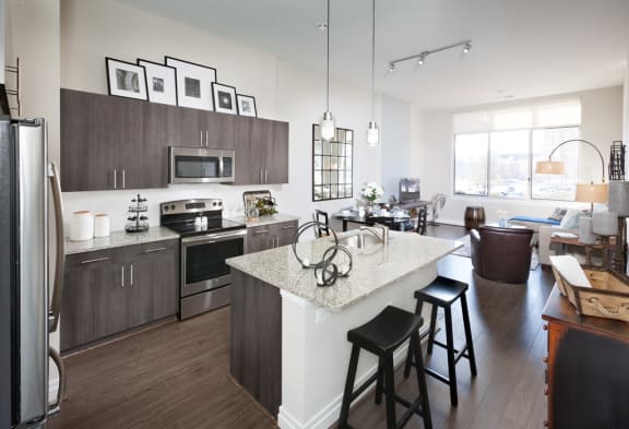 Wood floor and marble countertops at Harrison at Reston Town Center, Reston, VA, 20190