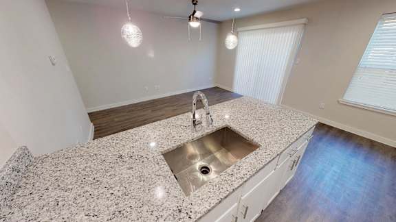 Open Kitchen with breakfast bar and deep farmhouse sink