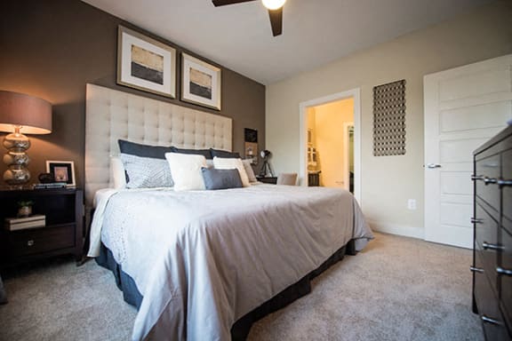 Carpet-flooring-in-bedroom at Link Apartments&#xAE; Brookstown, Winston Salem, North Carolina