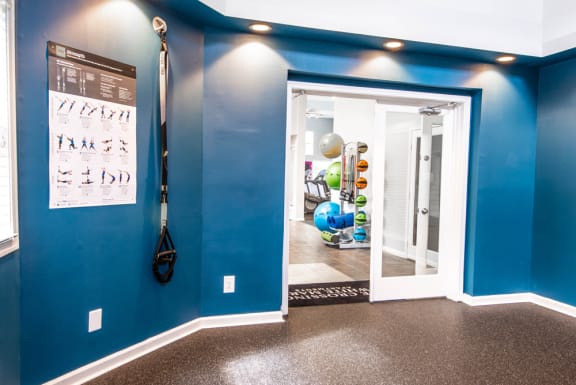 Fitness Center With Yoga/Stretch Area at The Crossings at White Marsh Apartments, White Marshl, Maryland