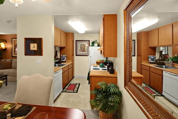 Dining Room and Kitchen View at Mission Sierra Apartments, California
