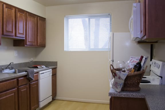 Kitchen with wooden cabinets at Somerset at Towson, Towson, MD
