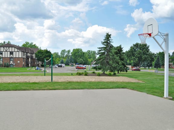 Outdoor Basketball and Sand Volleyball Court at Shannon Manor Townhomes in Davison, 48423