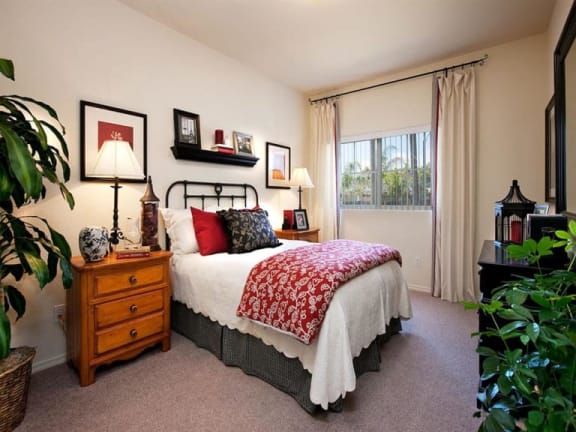 Bedroom With Expansive Windows at Sumida Gardens Apartments, Santa Barbara