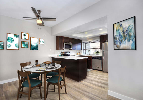 our spacious kitchen and dining room are open to the living room