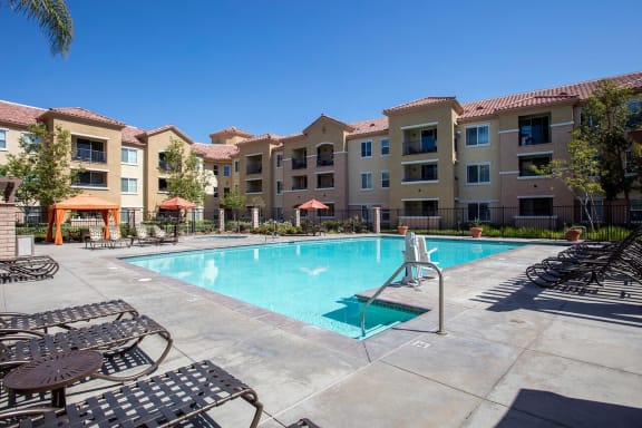 Swimming Pool And Relaxing Area at 55+ FountainGlen Grand Isle, California, 92562