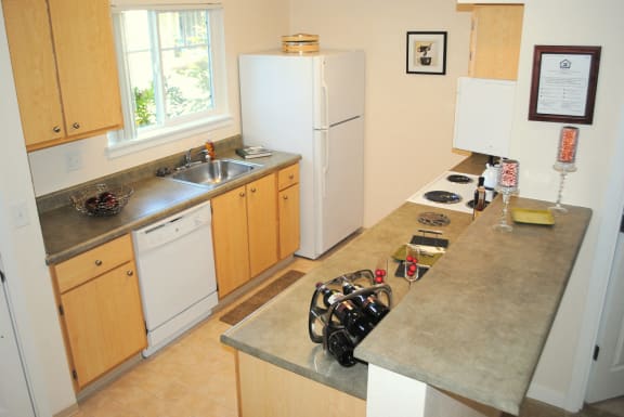 Kitchen with efficient appliances at Commons at Timber Creek Apartments, Oregon, 97229