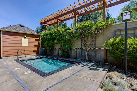 Swimming at Commons at Sylvan Highlands Apartments, Oregon, 97225